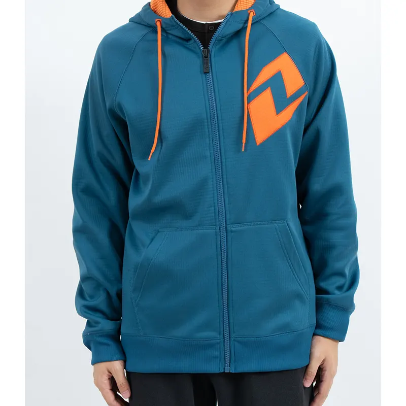 Sudadera con capucha raglán verde azulado con cremallera, gráfico naranja en el pecho y cordón